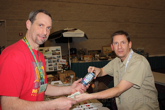 2009TAT_ 430.jpg - But Wait,Rob smits grabs a can from Dan Hable.